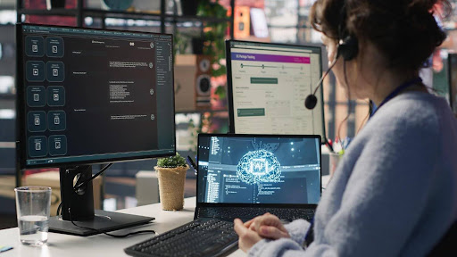 Woman working on her laptop with AI.